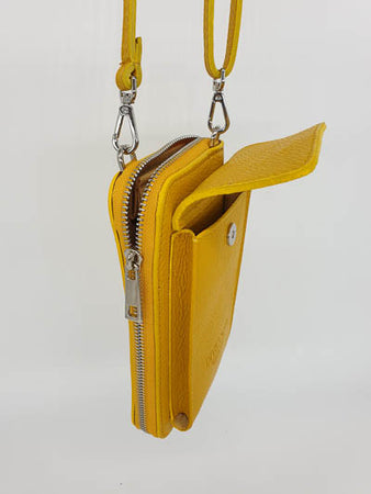 Un joli portefeuille et poche pour téléphone en cuir , petit et compact.