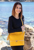 Votre joli sac en cuir jaune à multiples rangements et poches. 
