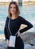 Bel article de maroquinerie en cuir et fait main blanc.